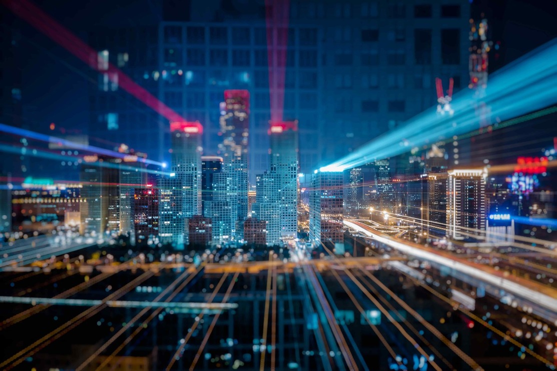 Image of a develop city with buildings and high technology effects